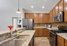 Kitchen with granite countertops and newer ap