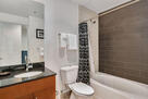 25th Floor Spire Condo Plus Den