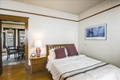 Bedroom with queen size Puffy Lux mattress fo