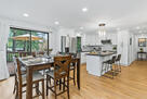 A spacious kitchen and dining area.