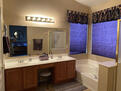 Master double sink with large tub/toilet room