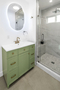 A lighted vanity mirror & marble countertop f