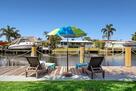 Relax in the sun, with tranquil water views