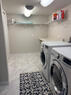 Washer a dryer, side view.