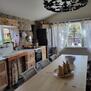 Kitchen large farm table, bright kitchen.