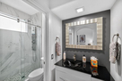 Light filled marble shower  in Roal Suite