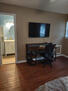 Bdrms have desk, chair, TV and dresser.