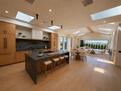 Open gourmet kitchen & living, pool views