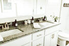 primary en suite bathroom with double vanity