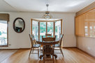 Eat in Kitchen table coupled w/ executive whi