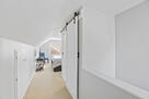 Upper hallway with cedar-lined closet