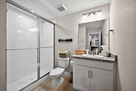 Basement guest bath with vanity and shower