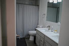Clean, modern bathroom with double vanity