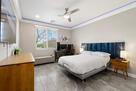 LG bed main floor, TV, adjustable bed, desk