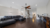 Large sofa with ottoman in spacious common ar
