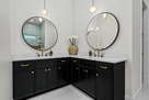 Double vanities w/back lit mirrors are sure t