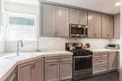 Newly remodeled kitchen has ample storage