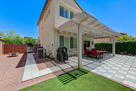 low Maintenance backyard. Firepit, barbecue.