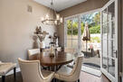 Dining area that opens to the back yard