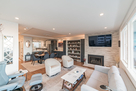 Living room with large flat screen TV, gas fi
