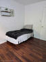Twin size bed in upstairs bedroom