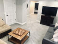 Basement area with 55&rdquo; flat screen.