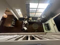 Looking down onto den from upstairs