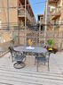 Unit 1 garage-roof deck with outdoor dining