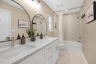 "Granite vanities, renovated primary bath"