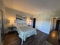 Second view of master bedroom, two closets