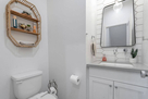 Powder room off living room on 2nd level