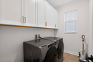Laundry Room w/ Large Capacity Washer/Dryer