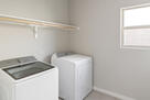 Laundry room located downstairs near mudroom 