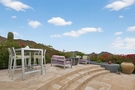 Elevated view terrace w/ firepit seating