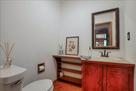 Half Bathroom located in hallway.