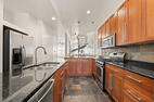 Kitchen sink, gas range and generous counter 