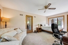 Bedroom 4 - custom large sofa, exit to patio,