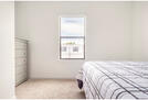 Bedroom #3 with queen bed, dresser and televi