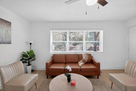 A bright, inviting living space featuring a c