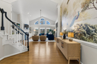 Living room with egret and peacock wall mural