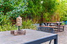Perfect Location, Tiki Backyard Layout