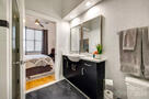 Quartz vanity and new mirrors in bath