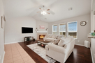 Wide-open living room with a gas fireplace