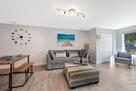 Bright and cozy living room filled with natur