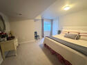 King Size bed in lower level bedroom