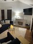 Living room area tv and fire place