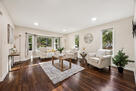 Bright open living area with hardwood floors