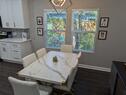Dining table looks out onto garden