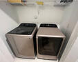 Full view of washer and dryer in laundry room