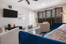Uptown Beach Themed Retreat with Balcony